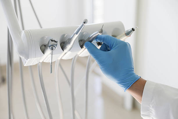 Professional Tooth Extraction technician working in Bourbon, IN